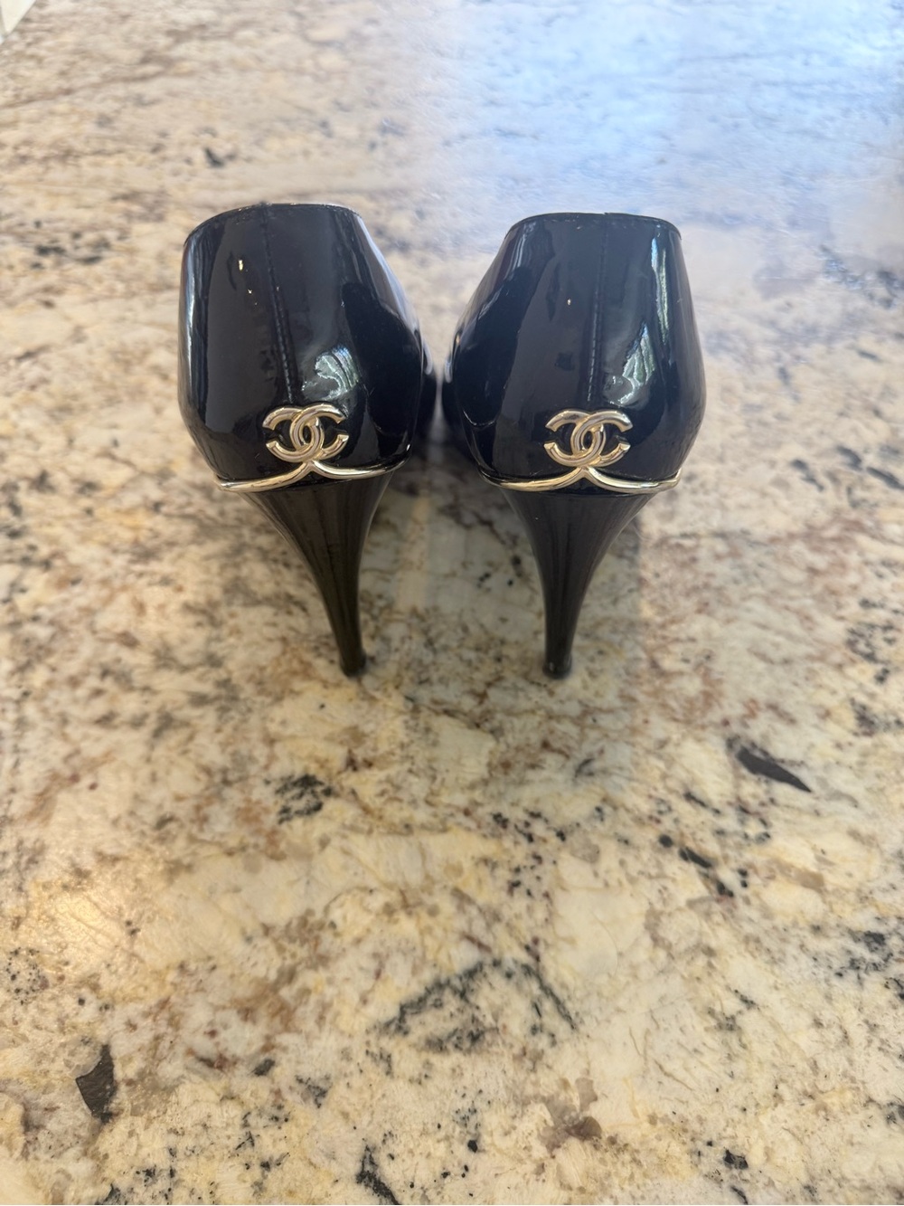 CHANEL Black Patent Leather Stiletto Pumps with Gold CC Accent